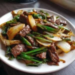 Boeuf sauté aux oignons