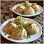 Xiao Long Bao in French is "Dumplings Chinois".