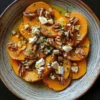 Butternut rôti avec feta, miel et noix, un plat délicieux et sain.